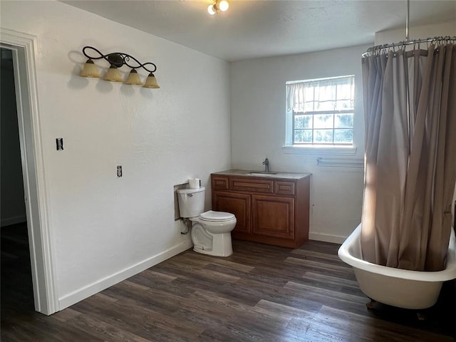 1808 Doris Ave, Tuttle, OK 73089 - bathroom with wood finished floors, a bath, and a shower with shower curtain