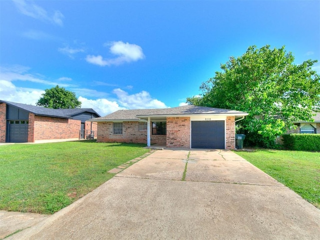 808 Robin Hill Rd, Edmond, OK 73003 - single story home with an attached garage, a front yard, brick siding, and concrete driveway