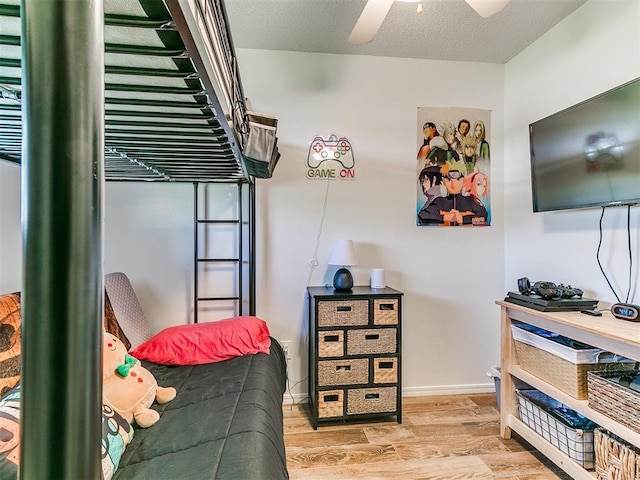 808 Robin Hill Rd, Edmond, OK 73003 - bedroom featuring light wood-type flooring, baseboards, and ceiling fan