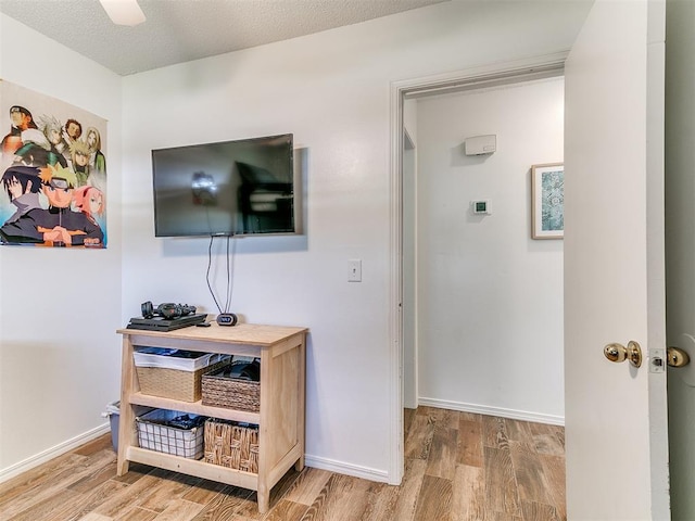 808 Robin Hill Rd, Edmond, OK 73003 - hallway with wood finished floors and baseboards