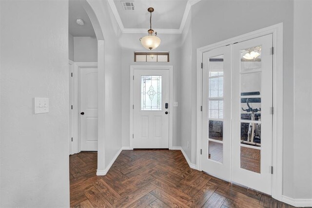 11240 NW 106th St, Yukon, OK 73099 - entrance foyer with arched walkways, crown molding, and baseboards