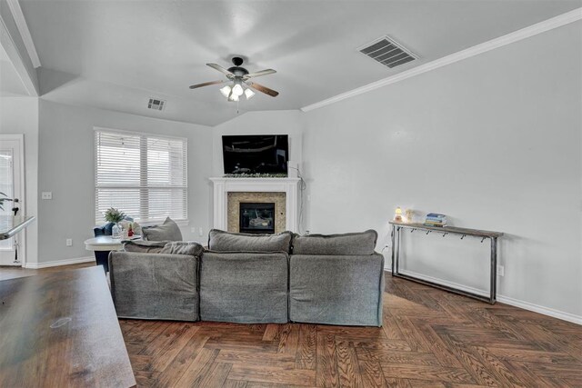 11240 NW 106th St, Yukon, OK 73099 - living area with a glass covered fireplace, a ceiling fan, baseboards, and ornamental molding