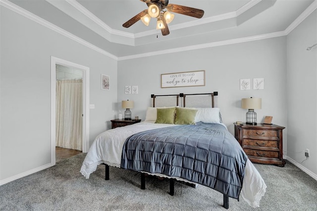 11240 NW 106th St, Yukon, OK 73099 - bedroom featuring a raised ceiling, carpet flooring, crown molding, ceiling fan, and baseboards