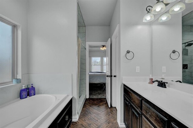 11240 NW 106th St, Yukon, OK 73099 - full bathroom featuring a garden tub, vanity, connected bathroom, and a shower