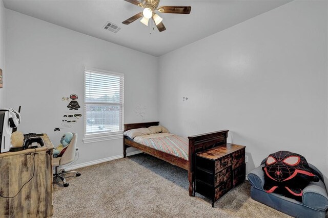 11240 NW 106th St, Yukon, OK 73099 - bedroom with carpet, baseboards, and ceiling fan