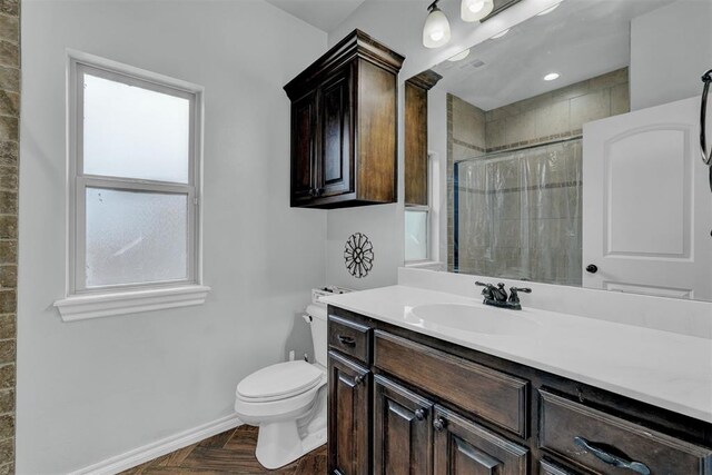 11240 NW 106th St, Yukon, OK 73099 - full bath with healthy amount of natural light, vanity, a tile shower, and toilet