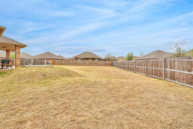 11240 NW 106th St, Yukon, OK 73099 - view of yard featuring a patio