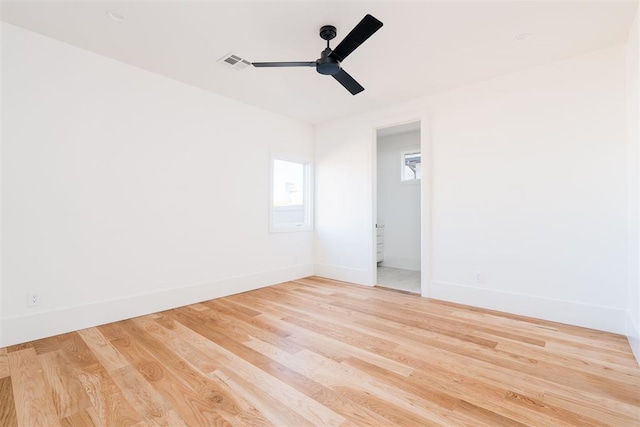 907 NW 44th St, Oklahoma City, OK 73118 - empty room with baseboards, wood finished floors, and a ceiling fan