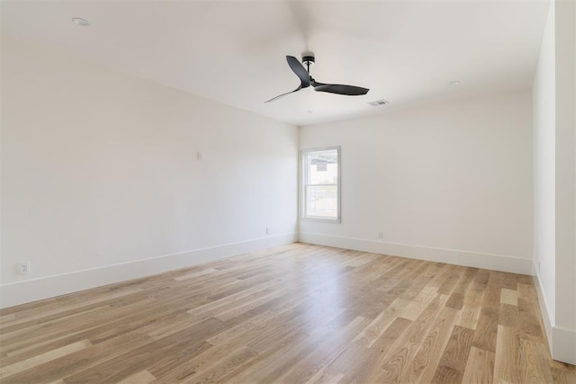 907 NW 44th St, Oklahoma City, OK 73118 - unfurnished room with ceiling fan, light wood-style flooring, and baseboards