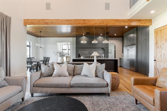 16000 N Hogback Rd, Luther, OK 73054 - living area with light wood-style floors, recessed lighting, arched walkways, and wooden ceiling