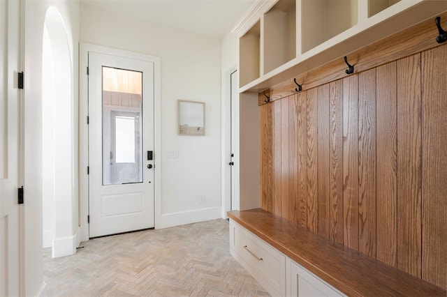 16000 N Hogback Rd, Luther, OK 73054 - mudroom with baseboards and arched walkways