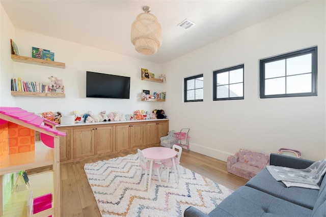 16000 N Hogback Rd, Luther, OK 73054 - playroom featuring light wood-style flooring and baseboards
