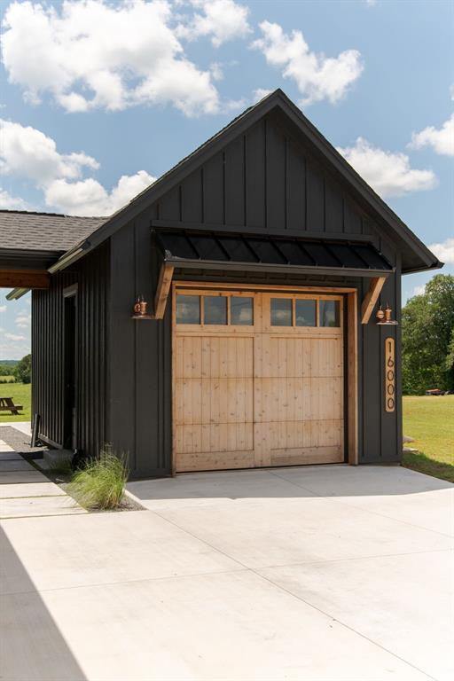 16000 N Hogback Rd, Luther, OK 73054 - garage with concrete driveway