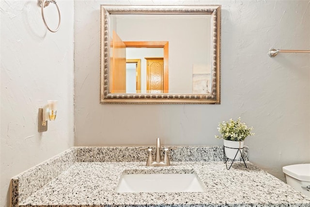 2016 Castle Rock, Edmond, OK 73003 - bathroom with vanity and toilet