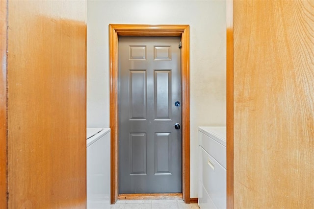 2016 Castle Rock, Edmond, OK 73003 - doorway to outside featuring separate washer and dryer