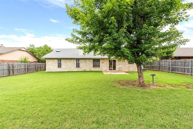 2016 Castle Rock, Edmond, OK 73003 - rear view of house with stone siding and a patio