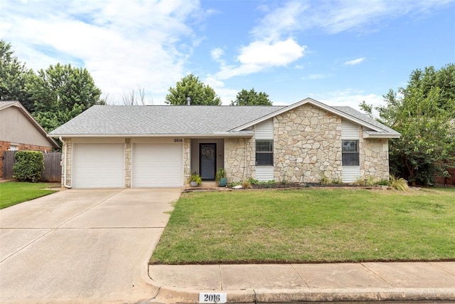 2016 Castle Rock, Edmond, OK 73003 - view of front of home featuring stone siding, concrete driveway, an attached garage, and a shingled roof