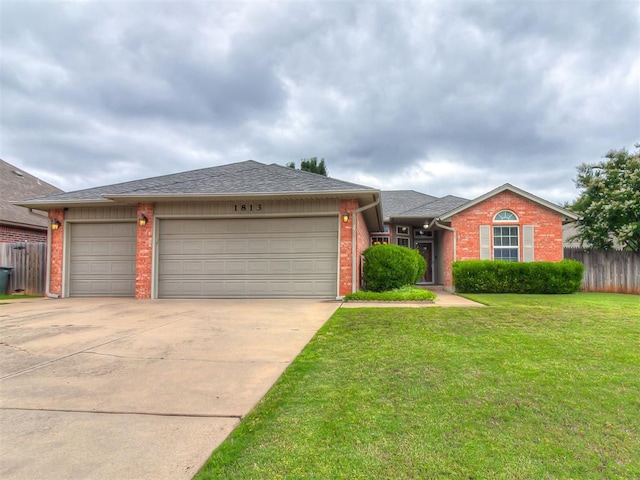 1813 Richard Dr, Edmond, OK 73003 - ranch-style home featuring brick siding, driveway, an attached garage, and a shingled roof