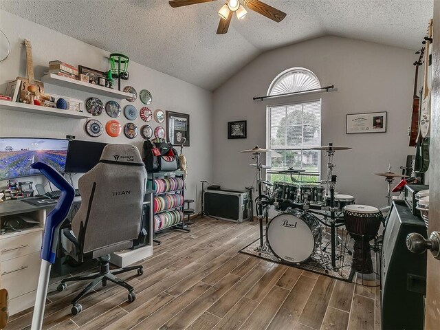 1813 Richard Dr, Edmond, OK 73003 - office with wood finished floors, a ceiling fan, lofted ceiling, and a textured ceiling