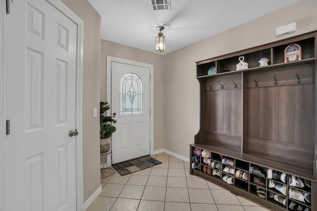 3224 Peacock Ln, Altus, OK 73521 - mudroom featuring baseboards and light tile patterned flooring