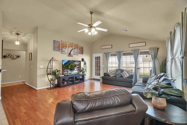 3224 Peacock Ln, Altus, OK 73521 - living area with ceiling fan, lofted ceiling, light wood finished floors, and baseboards