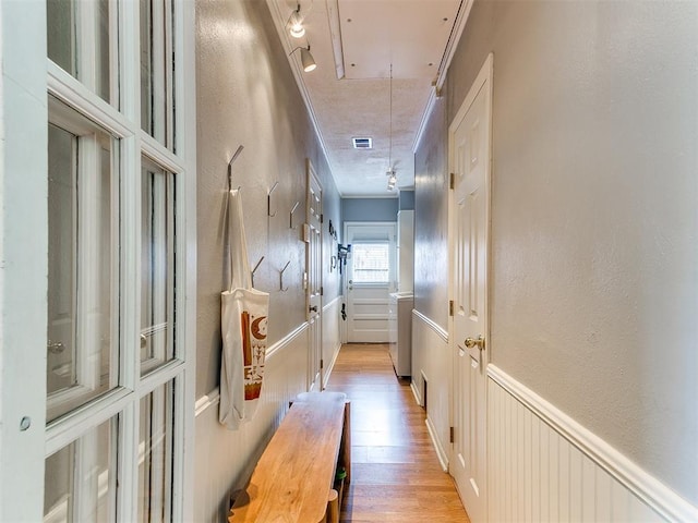 203 N Sherry Ave, Norman, OK 73069 - hall featuring attic access, light wood-style floors, and ornamental molding