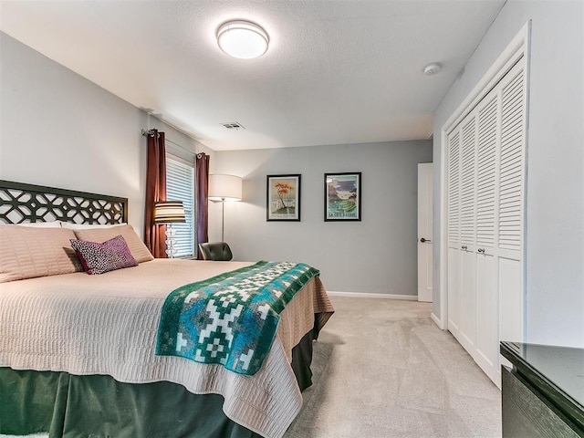 203 N Sherry Ave, Norman, OK 73069 - carpeted bedroom with baseboards and a closet
