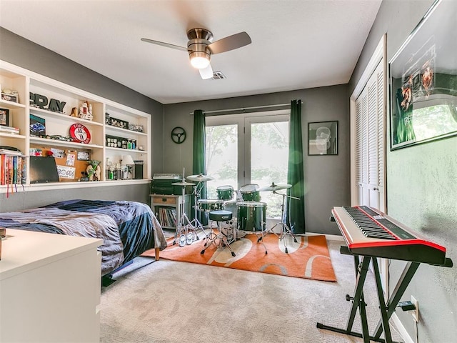 203 N Sherry Ave, Norman, OK 73069 - bedroom featuring a closet, carpet, and a ceiling fan