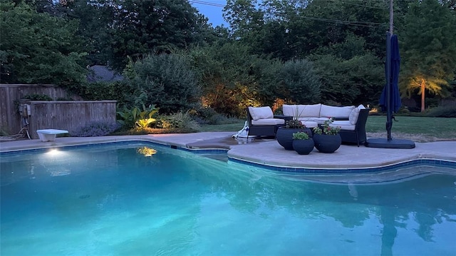 203 N Sherry Ave, Norman, OK 73069 - view of pool featuring a patio, an outdoor living space, and a diving board