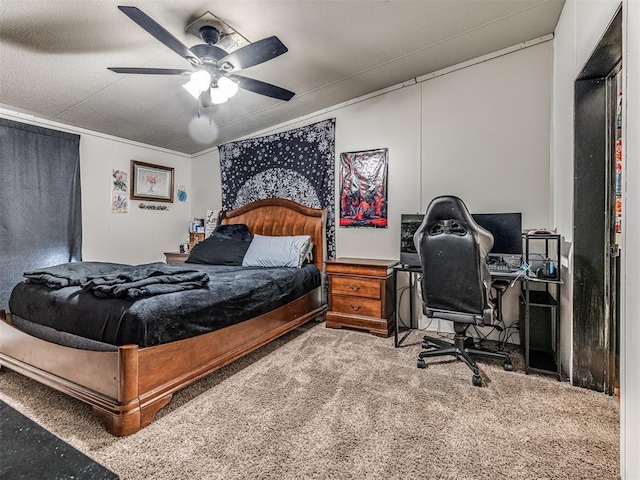14417 Longhorn Dr, Jones, OK 73049 - carpeted bedroom featuring ornamental molding, ceiling fan, and a desk