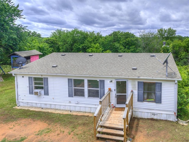 14417 Longhorn Dr, Jones, OK 73049 - view of front of property featuring a shingled roof and cooling unit