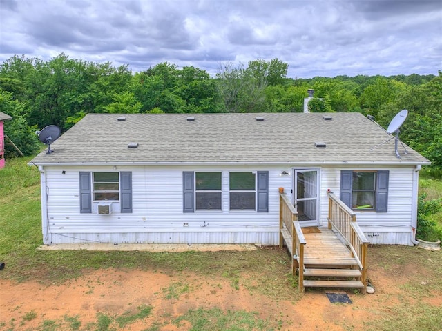 14417 Longhorn Dr, Jones, OK 73049 - view of front of house with roof with shingles and cooling unit