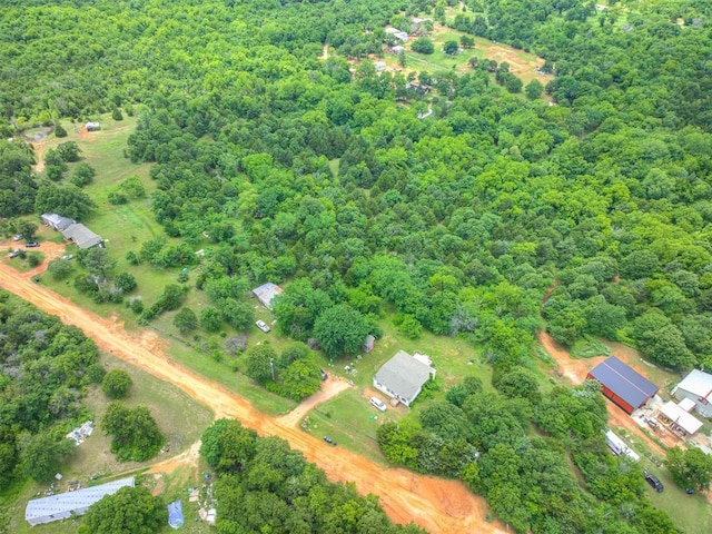 14417 Longhorn Dr, Jones, OK 73049 - aerial overview of property's location with a heavily wooded area