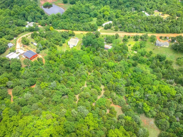 14417 Longhorn Dr, Jones, OK 73049 - aerial view of property and surrounding area with a heavily wooded area