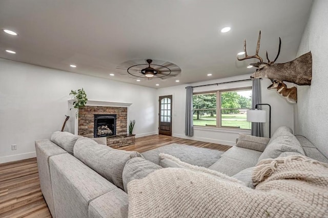2401 Davis Rd, Guthrie, OK 73044 - living room with recessed lighting, ceiling fan, wood finished floors, a fireplace, and baseboards