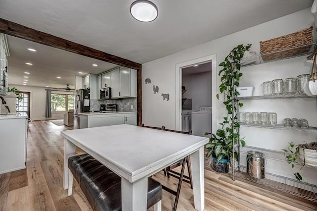 2401 Davis Rd, Guthrie, OK 73044 - dining space with beamed ceiling, light wood-style flooring, independent washer and dryer, and recessed lighting