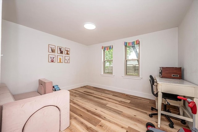 2401 Davis Rd, Guthrie, OK 73044 - home office with wood finished floors and baseboards
