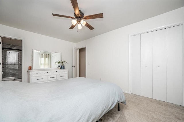 2401 Davis Rd, Guthrie, OK 73044 - bedroom featuring carpet, a closet, ceiling fan, and ensuite bath