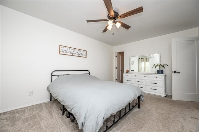2401 Davis Rd, Guthrie, OK 73044 - bedroom featuring light carpet and ceiling fan