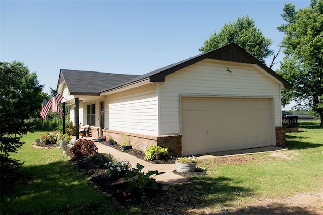 2401 Davis Rd, Guthrie, OK 73044 - view of front of property featuring a front lawn, brick siding, roof with shingles, and an attached garage