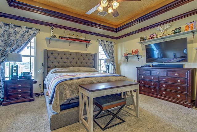 14220 SE 76th Pl, Oklahoma City, OK 73150 - carpeted bedroom featuring a raised ceiling, crown molding, and ceiling fan