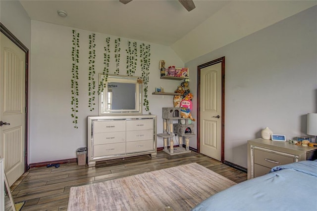 14220 SE 76th Pl, Oklahoma City, OK 73150 - bedroom featuring vaulted ceiling, baseboards, wood finished floors, and a ceiling fan