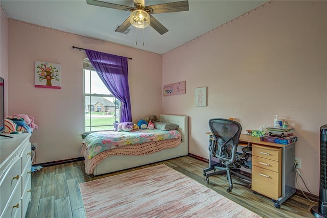 14220 SE 76th Pl, Oklahoma City, OK 73150 - bedroom featuring wood finished floors and ceiling fan