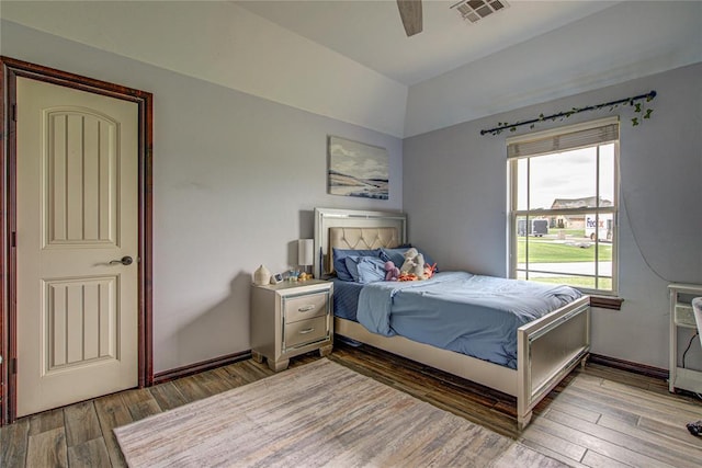 14220 SE 76th Pl, Oklahoma City, OK 73150 - bedroom featuring vaulted ceiling, wood finished floors, ceiling fan, and baseboards