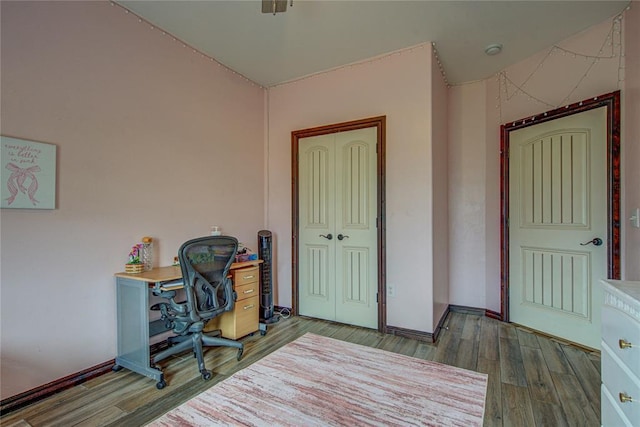 14220 SE 76th Pl, Oklahoma City, OK 73150 - home office with wood finished floors and baseboards