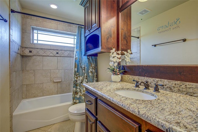 14220 SE 76th Pl, Oklahoma City, OK 73150 - full bathroom featuring vanity, toilet, tile patterned floors, and shower / tub combo