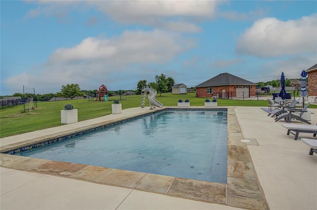 14220 SE 76th Pl, Oklahoma City, OK 73150 - view of swimming pool with a water slide, a playground, and a patio area