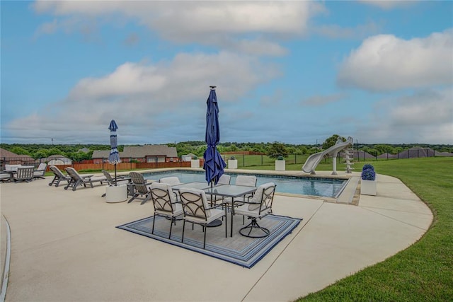 14220 SE 76th Pl, Oklahoma City, OK 73150 - view of pool with a water slide and a patio