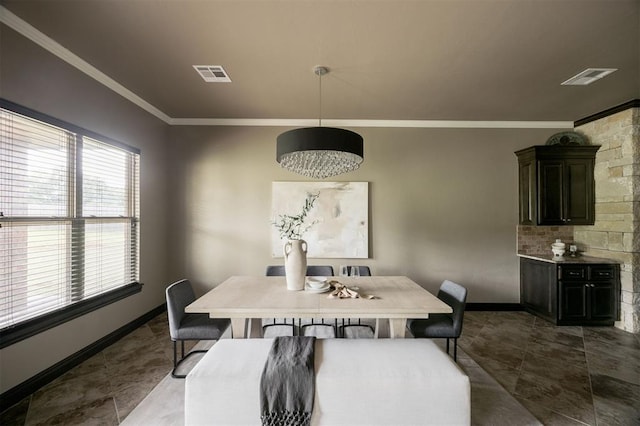 15101 Colonia Bella Dr, Edmond, OK 73013 - dining room with ornamental molding, baseboards, and dark tile patterned floors