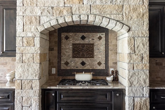 15101 Colonia Bella Dr, Edmond, OK 73013 - kitchen with stainless steel gas cooktop and light stone countertops